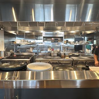 The Silver King Coastal Kitchen - Beautiful kitchen, happy chef - New American Near Me - Fort Myers, Florida