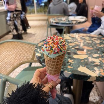 Sampaguita - Buko pandan with rainbow sprinkles in a waffle cone - Ice Cream & Frozen Yogurt Near Me - Orlando, Florida Sampaguita - Buko pandan with rainbow sprinkles in a waffle cone - Ice Cream & Frozen Yogurt Near Me - Orlando, Florida