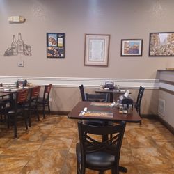Estella's Pizzeria - Setting up Tables
