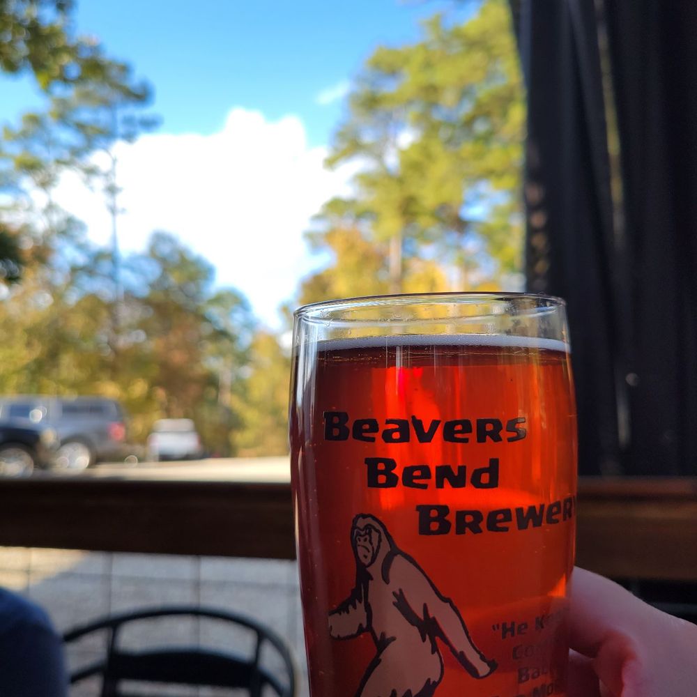 Beavers Bend Brewery - a person holding a glass of beer - Breweries Near Me - Broken Bow, Oklahoma Beavers Bend Brewery - a person holding a glass of beer - Breweries Near Me - Broken Bow, Oklahoma