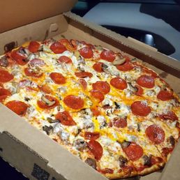 Large cheese, sausage, mushroom, and pepperoni pizza
