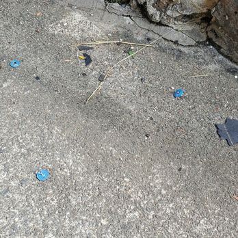 On Top Roofing - Nails in our driveway. - Roofing Near Me - Aiea, Hawaii