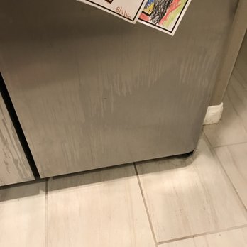 Clean Investment - Damaged Fridge - Carpet Cleaning Near Me