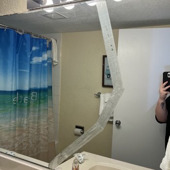 Hawaiian Inn - Cracked mirror - Hotels Near Me - Daytona Beach, Florida Hawaiian Inn - Cracked mirror - Hotels Near Me - Daytona Beach, Florida