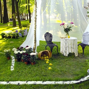 Janina's Landscape Designs - a table and chairs in a garden - Landscaping Near Me - West Caldwell, New Jersey Janina's Landscape Designs - a table and chairs in a garden - Landscaping Near Me - West Caldwell, New Jersey