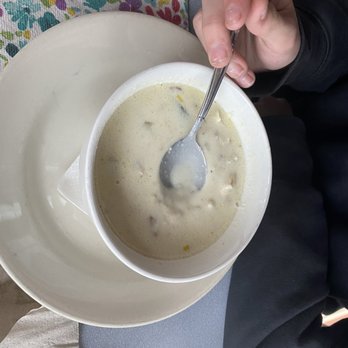 The Landings Restaurant - a bowl of soup with a spoon in it - Seafood Near Me - Rockland, Maine The Landings Restaurant - a bowl of soup with a spoon in it - Seafood Near Me - Rockland, Maine
