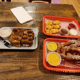pastrami sandwich, pretzels, chicken nuggets pastrami sandwich, pretzels, chicken nuggets