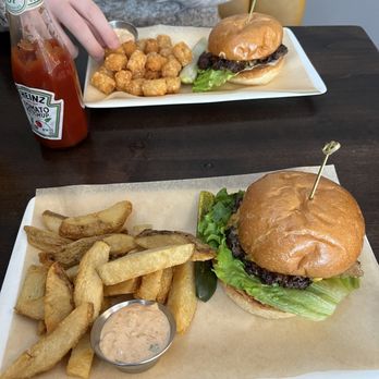 Cole Valley Tavern - Smash Burger x2 with tots in back and fries in front - Cocktail Bars Near Me - San Francisco, California
