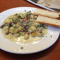 Cafe Boutique and Cake Shop - Potato gnocchi w/pesto cream sauce, mushrooms and peppers.