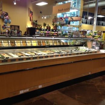 Kroger - a variety of food in a display case - Grocery Near Me - Alpharetta, Georgia