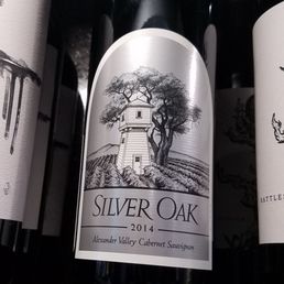 On the shelves in a well stocked wine selection On the shelves in a well stocked wine selection