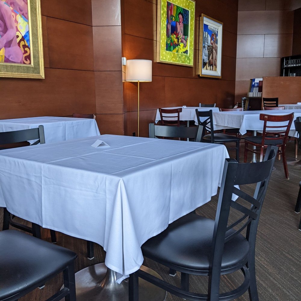Rigoletto's Cafe - tables and chairs in a restaurant - Italian Near Me - Edmonton, Alberta Rigoletto's Cafe - tables and chairs in a restaurant - Italian Near Me - Edmonton, Alberta