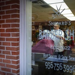 Shepard's Barber Shop - Leon cutting hair
