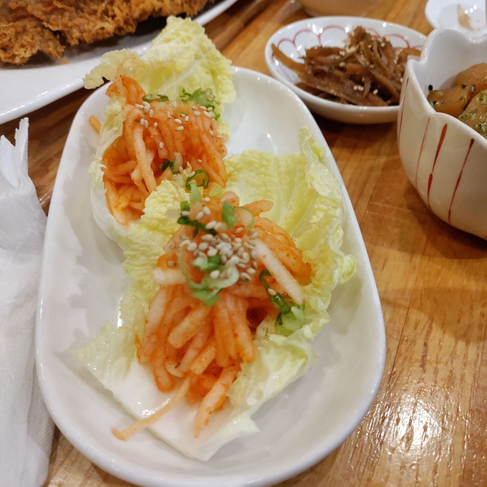 Yory Korean Cuisine - Appitizer spicy daikon on lettuce wraps. Served cold a refreshing delicious taste. - Korean Near Me - Surrey, British Columbia Yory Korean Cuisine - Appitizer spicy daikon on lettuce wraps. Served cold a refreshing delicious taste. - Korean Near Me - Surrey, British Columbia