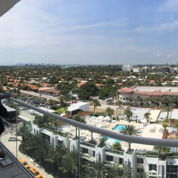 Grand Beach Hotel Surfside - Sunset view balcony looking over city. - Hotels Near Me - Surfside, Florida