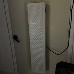 Lou Koko Beauty Lounge - Red light therapy panel, sit or stand.