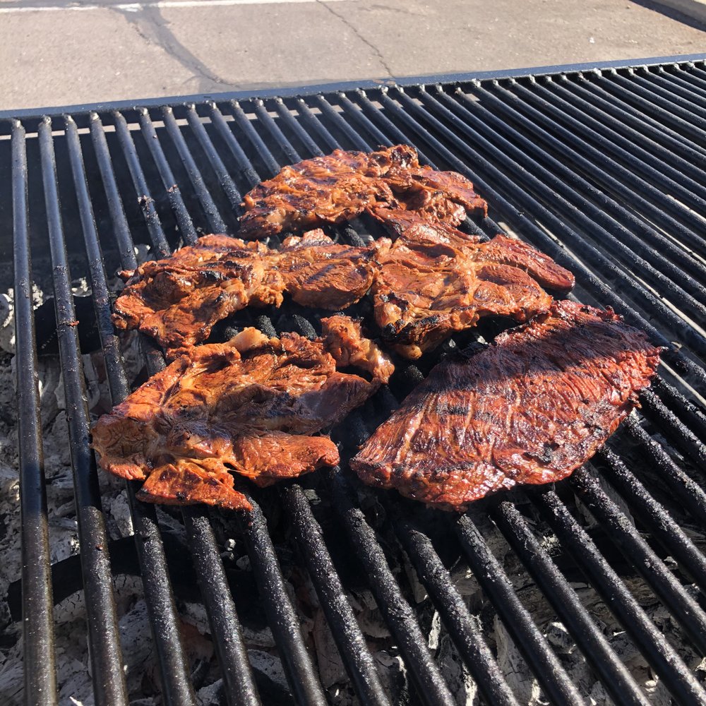 Rancheros Carniceria - Carne Asada steaks cooking on the grill. - Butcher Near Me - Tucson, Arizona Rancheros Carniceria - Carne Asada steaks cooking on the grill. - Butcher Near Me - Tucson, Arizona