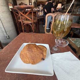 Rose tea with a croissant