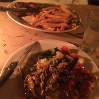 Tango Sur - 12oz. Sirloin with fries and the BEST Pork Chop. - Latin American Near Me - Chicago, Illinois Tango Sur - 12oz. Sirloin with fries and the BEST Pork Chop. - Latin American Near Me - Chicago, Illinois