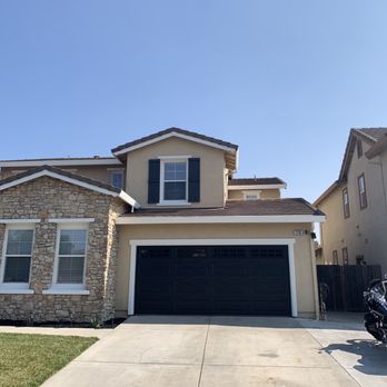 John's Garage Doors - Black garage door with the Stockton window - Garage Door Services Near Me John's Garage Doors - Black garage door with the Stockton window - Garage Door Services Near Me