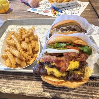 Shake Shack Henderson - Bacon Cheeseburger, White Truffle Burger, Fries Kiddies get a free coloring paper! - Burgers Near Me - Henderson, Nevada Shake Shack Henderson - Bacon Cheeseburger, White Truffle Burger, Fries Kiddies get a free coloring paper! - Burgers Near Me - Henderson, Nevada