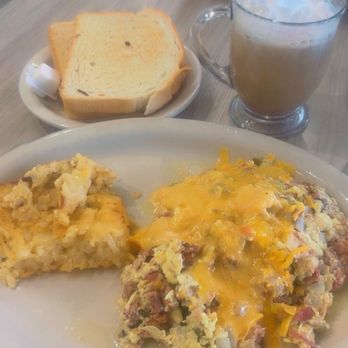 The Toasted Yolk Cafe - Brisket Scramble hash, Side Hashbrown Casserole - Breakfast & Brunch Near Me - Cypress, Texas The Toasted Yolk Cafe - Brisket Scramble hash, Side Hashbrown Casserole - Breakfast & Brunch Near Me - Cypress, Texas