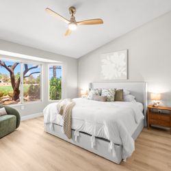 Huntington & Ellis - Spacious primary bedroom featuring a comfortable layout, modern finishes, and elegant Las Vegas luxury home design.
