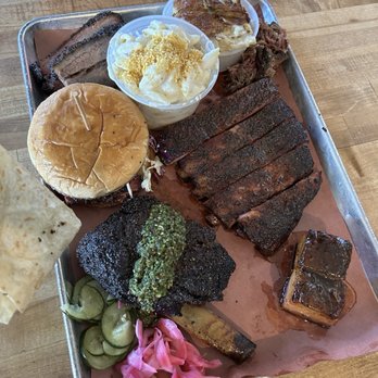 Interstellar BBQ - Brisket, scalloped potatoes, mac, brisket sandwich (sliced), pork ribs, beef rib, pork belly - Barbeque Near Me - Austin, Texas Interstellar BBQ - Brisket, scalloped potatoes, mac, brisket sandwich (sliced), pork ribs, beef rib, pork belly - Barbeque Near Me - Austin, Texas