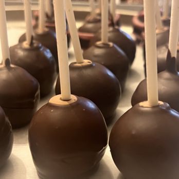Delicacy Treats - Date pops-Enjoy the deliciousness of a cake pop without the guilt--made with just dates and dark chocolate. - Desserts Near Me Delicacy Treats - Date pops-Enjoy the deliciousness of a cake pop without the guilt--made with just dates and dark chocolate. - Desserts Near Me