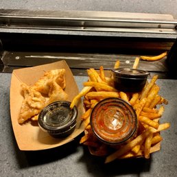 Fried chicken dumplings and seasoned fries Fried chicken dumplings and seasoned fries