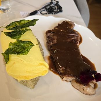 The Royale - Omurice and steak.. maybe the presentation could've been alittle better. But was pretty good.. a little spicy. - Breakfast & Brunch Near Me - Pleasant Hill, California The Royale - Omurice and steak.. maybe the presentation could've been alittle better. But was pretty good.. a little spicy. - Breakfast & Brunch Near Me - Pleasant Hill, California