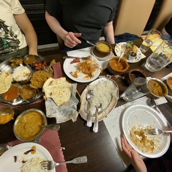 Madras Masala - Mughlai Chicken on the left and Chicken Tikka Masala ok the far top right and right. - Indian Near Me - Ann Arbor, Michigan Madras Masala - Mughlai Chicken on the left and Chicken Tikka Masala ok the far top right and right. - Indian Near Me - Ann Arbor, Michigan