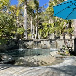 Flagstone patio, pool beach entry, double stone pool coping