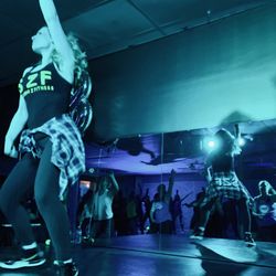 Studio Z Fitness - Owner Alisa leading a Zumba class