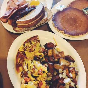 Campfire Grill - The Lumberjack with hot cakes (top), and breakfast flatbread. - American Near Me - Depew, New York