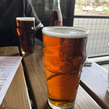 Canteen Taproom - Amber with Coke bottle in background - Breweries Near Me - Albuquerque, New Mexico