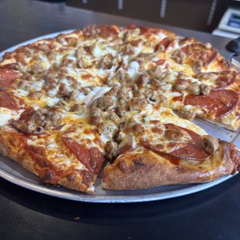 Twin Foxes - medium sausage and mushroom pizza $23 - Bars Near Me - Everett, Washington
