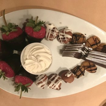 Hugo's Cellar - Complimentary chocolate dipped strawberries, dried figs and dried apricots - American Near Me - Las Vegas, Nevada Hugo's Cellar - Complimentary chocolate dipped strawberries, dried figs and dried apricots - American Near Me - Las Vegas, Nevada