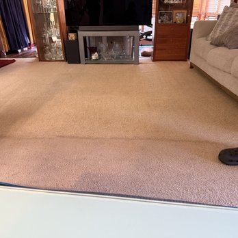 Rainbow Pro Carpet Cleaning - Joe and his team working on the living room - Carpet Cleaning Near Me