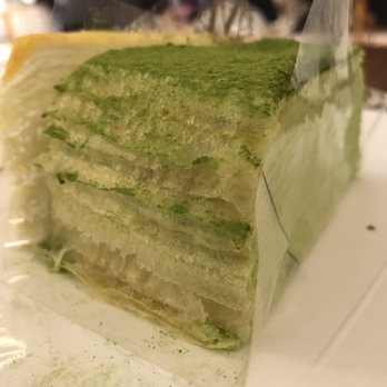 Lady M Cake Boutique - Each slice separated by a clear plastic liner - Bakeries Near Me - Tysons, Virginia Lady M Cake Boutique - Each slice separated by a clear plastic liner - Bakeries Near Me - Tysons, Virginia
