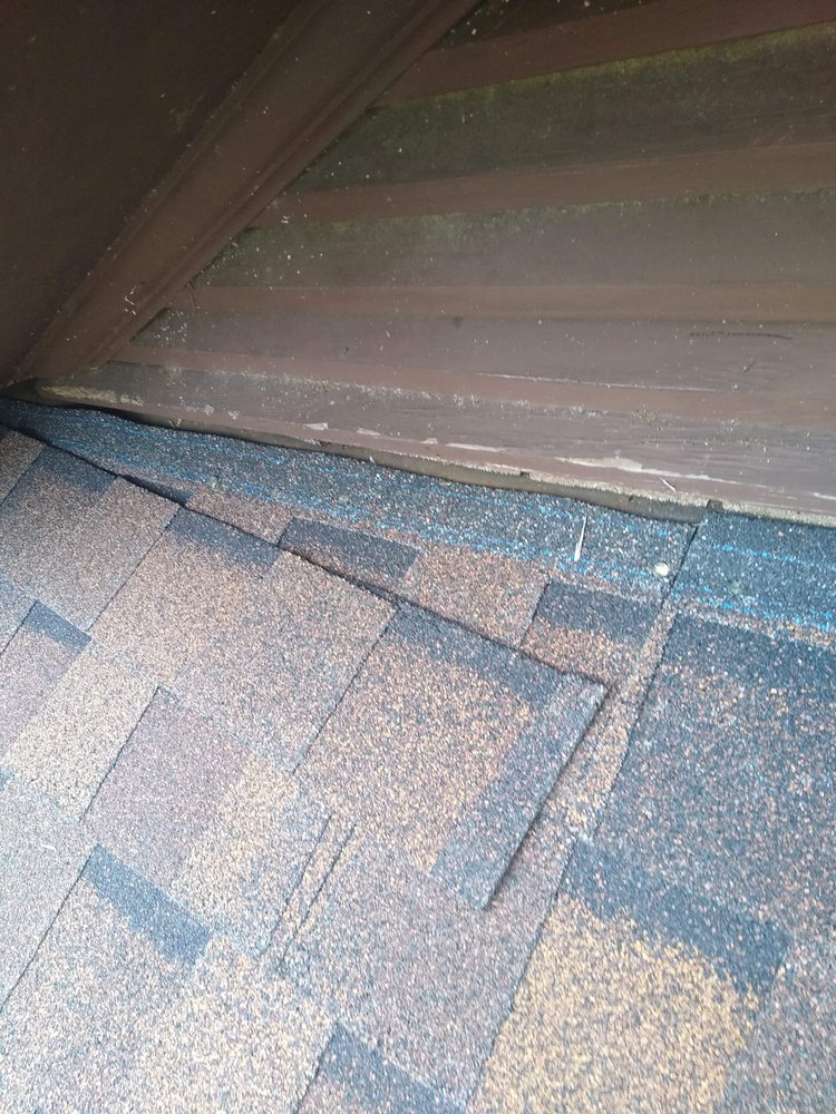 Slide of RJR Roofing