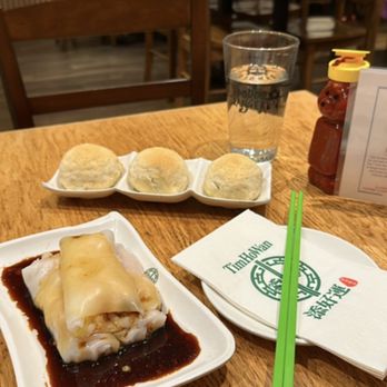 Tim Ho Wan - Hell's Kitchen - Baked BBQ Pork Buns, Steamed Rice Roll w/ Shrimp & Chives - Dim Sum Near Me - New York, New York Tim Ho Wan - Hell's Kitchen - Baked BBQ Pork Buns, Steamed Rice Roll w/ Shrimp & Chives - Dim Sum Near Me - New York, New York