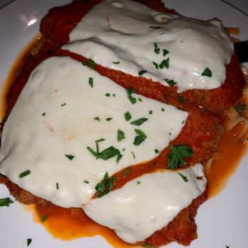 Cafe Silvium - Chicken cutlet parm over fettuccine - Italian Near Me - Stamford, Connecticut Cafe Silvium - Chicken cutlet parm over fettuccine - Italian Near Me - Stamford, Connecticut