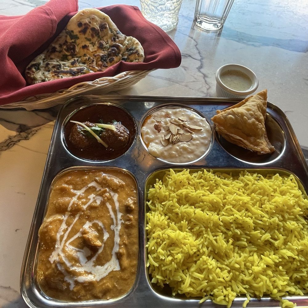 Sofi'z Kitchen & Bar - Butter chicken, meatballs, rice, sopa and naan. I forgot what the name of the stuff is in the middle but it was delicious too. - Pakistani Near Me - Chico, California Sofi'z Kitchen & Bar - Butter chicken, meatballs, rice, sopa and naan. I forgot what the name of the stuff is in the middle but it was delicious too. - Pakistani Near Me - Chico, California