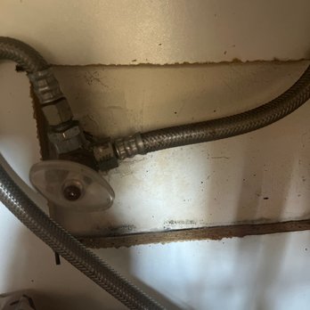 Beal Properties - Mold behind sink from leak - Property Management Near Me - Chicago, Illinois
