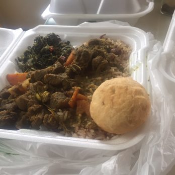 Come Into Jamaica - Goat curry, beans and rice, side greens and fry bread. - Caribbean Near Me - Utica, New York Come Into Jamaica - Goat curry, beans and rice, side greens and fry bread. - Caribbean Near Me - Utica, New York