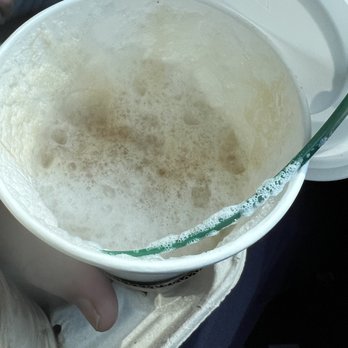 Starbucks - a person holding a cup of coffee - Coffee & Tea Near Me - Yardley, Pennsylvania Starbucks - a person holding a cup of coffee - Coffee & Tea Near Me - Yardley, Pennsylvania