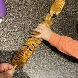 Burger Factory - Tornado fries (and someone who couldn't wait to try them)