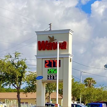 Wawa - a gas station with a clock tower - Gas Stations Near Me - Saint Petersburg, Florida