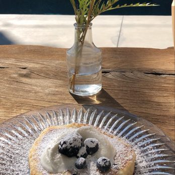 Chef Dean Karatas - An airy, light & perfectly sweet blueberry pancake sprinkled with powdered sugar - Personal Chefs Near Me Chef Dean Karatas - An airy, light & perfectly sweet blueberry pancake sprinkled with powdered sugar - Personal Chefs Near Me